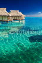 Naklejki Water villas over tropical reef