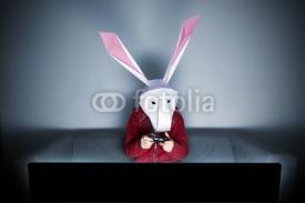 Fototapety Rabbit gamer on the sofa
