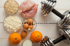 Fototapety Dumbbells and healthy food