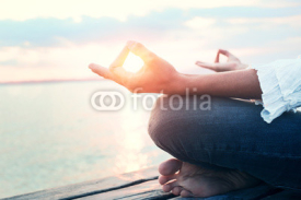 Fototapety Peaceful woman finding body and mind balance