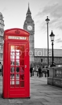 Naklejki Red phone booth in London with the Big Ben in black and white