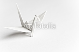 Naklejki An origami bird on a white background