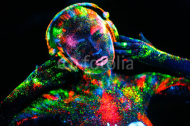 Naklejki Topless girl painted in UV powder as a DJ panel.