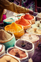 Naklejki Traditional spices and dry fruits in local bazaar in India.