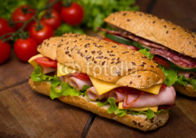 Naklejki Sandwiches on the wooden table