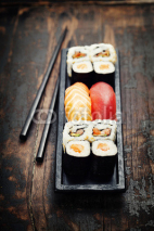 Fototapety sushi with chopsticks