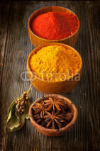 Naklejki Spices curry, paprika, bay leaf and star anise
