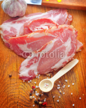Fototapety Bacon with aroma spice on the wooden board
