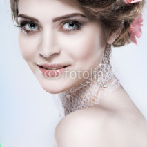 Fototapety Beautiful  girl, on a light background, emotions, cosmetics