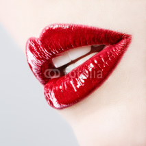 Fototapety Beautiful female with red shiny lips close up