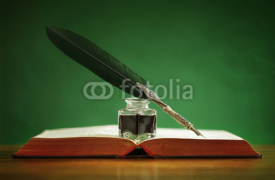 Fototapety Quill pen and inkwell on old book