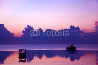 Ocean sunset, boat. Indian Ocean