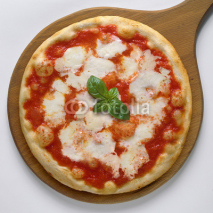 Fototapety Pizza margherita intera su pala di legno