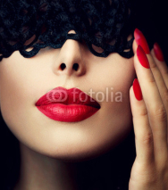 Naklejki Beautiful Woman with Black Lace Mask over her Eyes