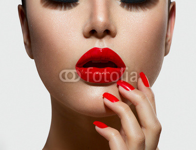 Red Sexy Lips and Nails closeup. Manicure and Makeup