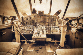 Fototapety Cockpit view of the old retro plane.