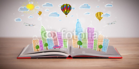 cityscape drawing on open book
