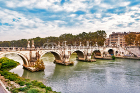 Naklejki Bridge Ponte Sant Angelo in Rome across river Tiber in Rome