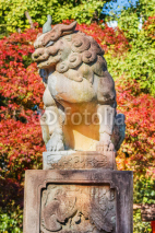 Naklejki Japanese Stone Lion Sculpture at Yasaka-jinja in Kyoto