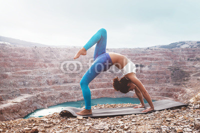 Girl training yoga pose outdoor