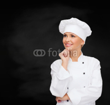 smiling female chef dreaming