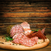 Fototapety Smoked sausage with rosemary and peppercorns