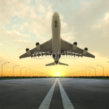 Naklejki takeoff plane in airport at sunset