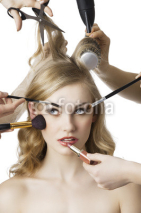 in beauty salon, the girl looks up at right