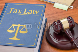 Naklejki A law book with a gavel - Tax law