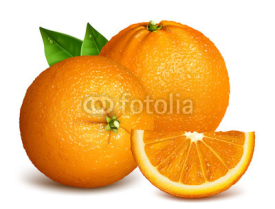 Whole ripe oranges and slices of orange