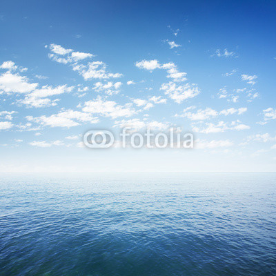 blue sky over sea or ocean water surface
