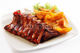 Naklejki Grilled Pork Rib and Fried Potatoes on Plate