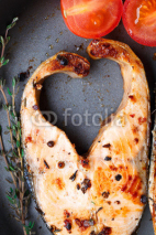 Naklejki Salmon steak with thyme and pepper