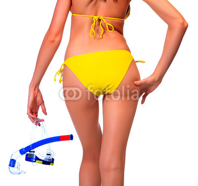 Woman in bikini with the equipment for diving
