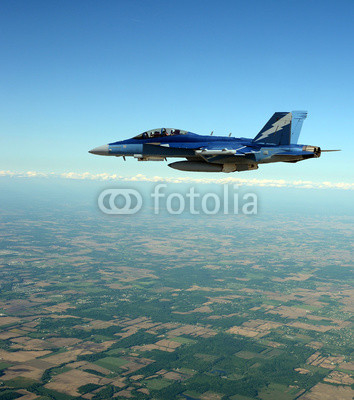 Jet figter flying at high altitude