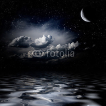 Night sky stars reflecting in sea