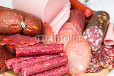 sausages on wooden board