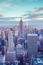 Naklejki New York City skyline under pastel evening sky