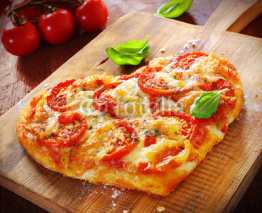 Heart shaped vegetarian pizza