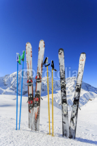 Fototapety Skiing,  mountains and ski equipments on ski run