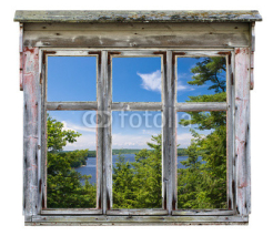 Fototapety Scenic view seen through an old window frame