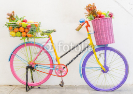 Fototapety Bicycle with basket fruit and flower
