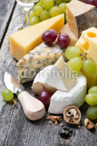 Naklejki assortment of fresh cheeses, grapes and walnuts