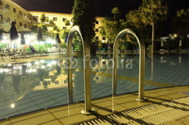 resort swimming pool late night