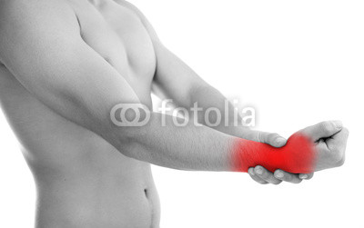 Sportsman with pain in wrist isolated on white