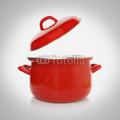 Red cooking pot on grey background
