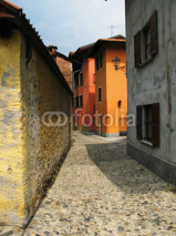 Naklejki Narrow street of Cannobio town, Italy ..