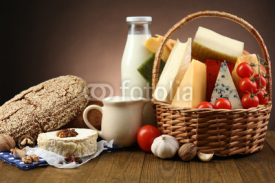 Fototapety Basket with tasty dairy products