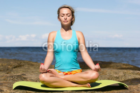 Naklejki young caucasian fitness woman practicing yoga