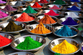 Naklejki On the photo: Colorful tika powders on Orcha market, India